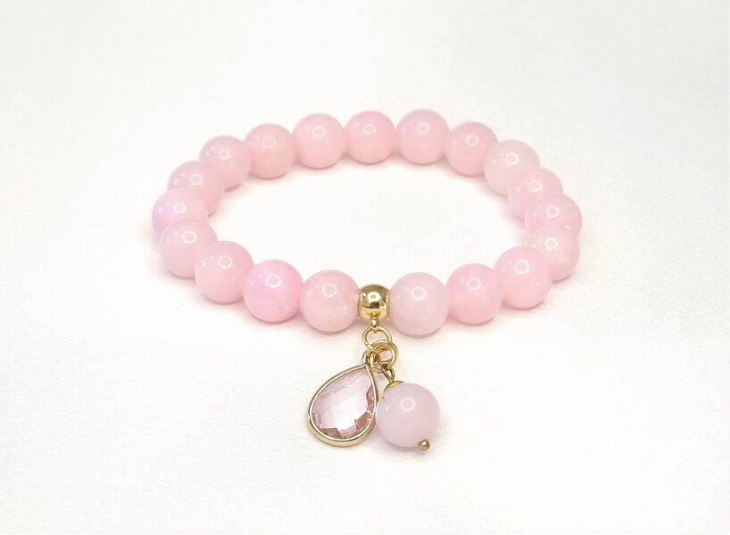 Rozā ahāta rokassprādze ar caurspīdīgu lāses piekariņu